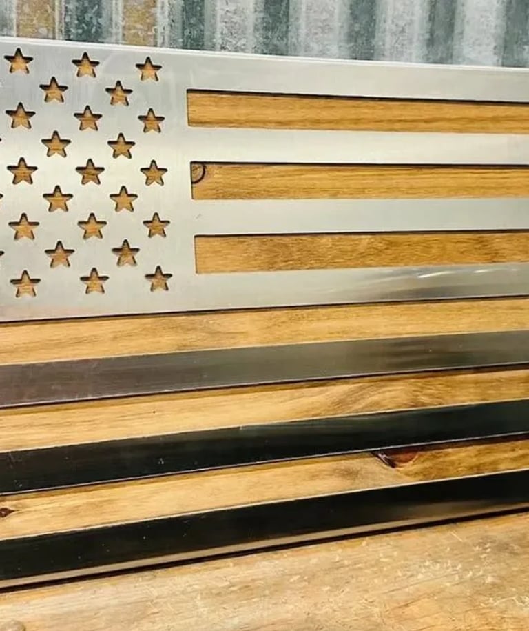 Wooden American flag wall art with gold stars and natural wood stripes in alternating finishes