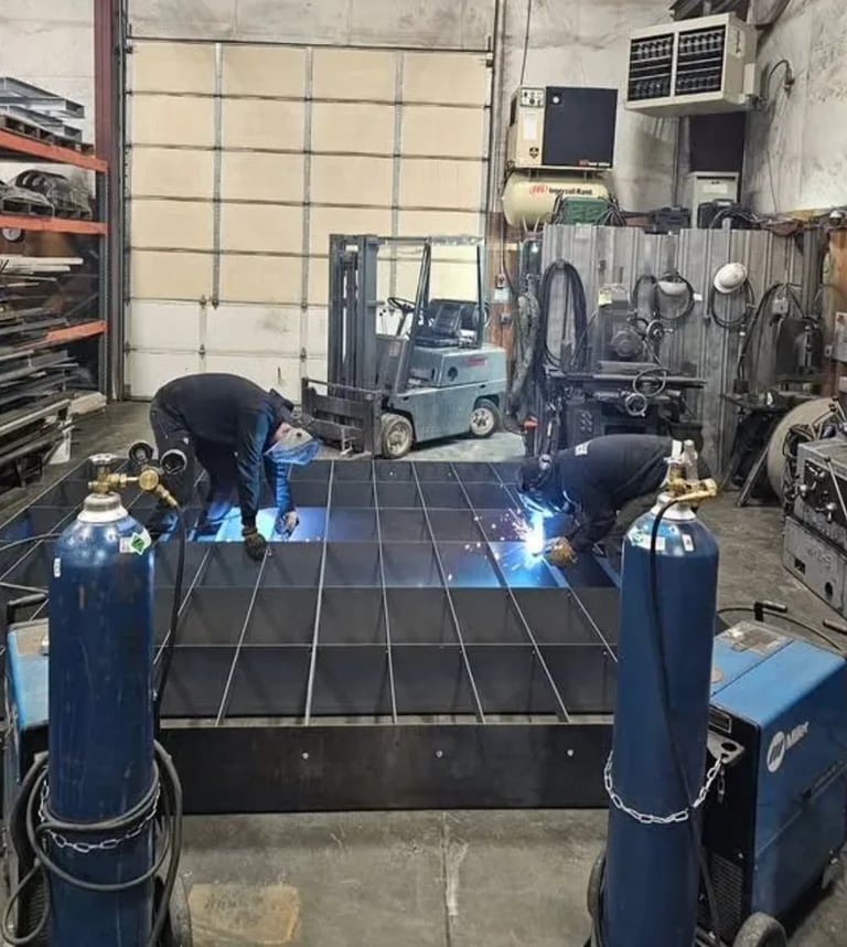 Auto repair shop with vehicle on four-post lift for service, welding torches visible, industrial garage setting